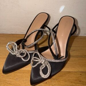 BCBGeneration Black and Silver Strappy Heels